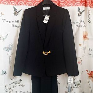 New women's business suit with tags .